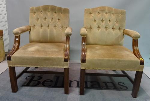 A pair of George III style mahogany framed Gainsborough open armchairs, 47cm wide x 98cm high.
