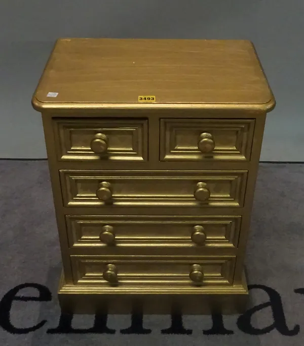 A modern gold painted chest of two short and three long drawers, 46cm wide x 56cm high.
