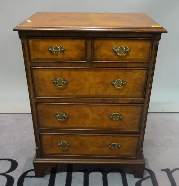 A George II style walnut side chest of two short and three long drawers on bracket feet, 55cm wide x 77cm high.