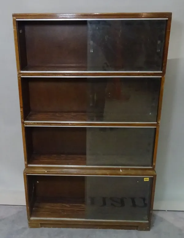 A 20th century four section walnut Minty modular bookcase, 81cm wide.