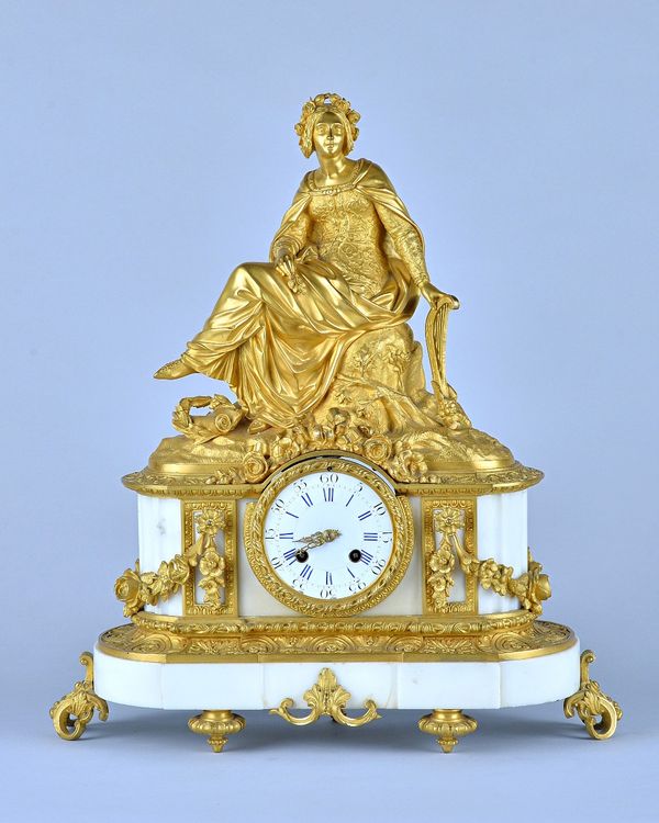 A French gilt bronze and white marble mantel clockCirca 1870Modelled with a Renaissance ladyThe drum-shaped movement stamped PICKARD 354, Vincenti cac