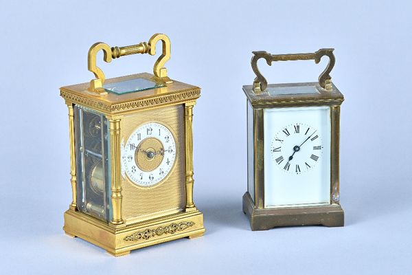 A French gilt brass carriage clock, with visible platform escapement, the twin train movement striking on a gong, backplate detailed R&CO Made In Pari