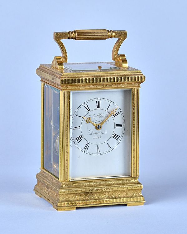 A French engraved gilt brass repeating carriage clock  Retailed by James McCabe, Royal Exchange, London No. 01782, made by Richard & Co    With origin