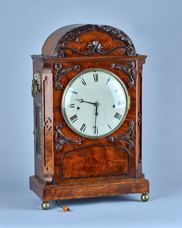 An early Victorian mahogany three train quarter striking bracket clockThe arched case with canted angles, with carved foliate decoration, the 8in whit