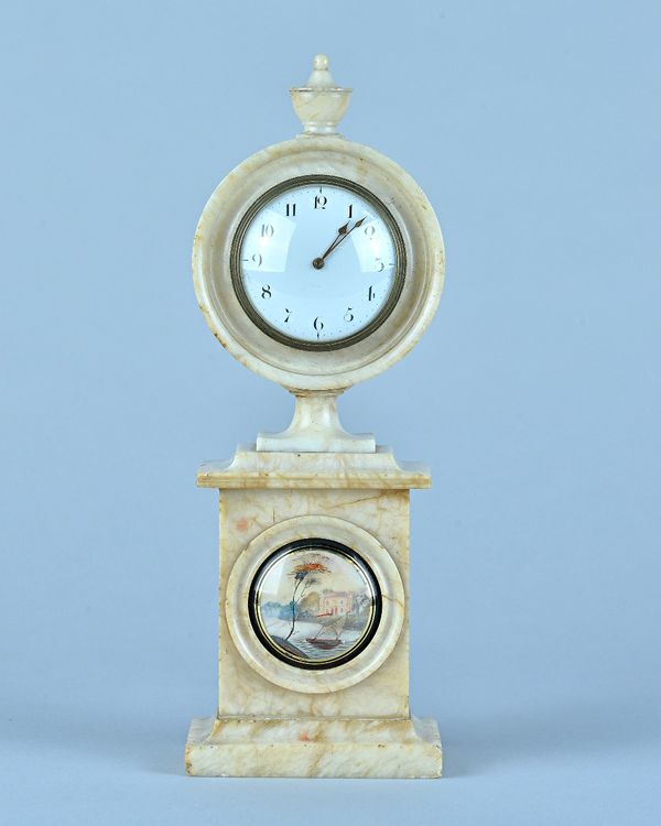 A Regency alabaster mantel timepieceSurmounted by an urn, with 2 3/4in white enamel dial, later French drum-shaped movement with platform lever escape
