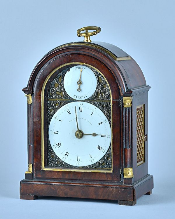 A George III mahogany bracket clockBy Marriott, Fleet Street, LondonWith a brass carrying handle above the broken arch, glazed door, with 4in arched d