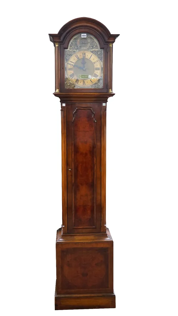 A walnut longase clock, 20th CenturyThe movement with Westminster, Winchester and Whittington chimes, on short steel straight gongs, the arched brass