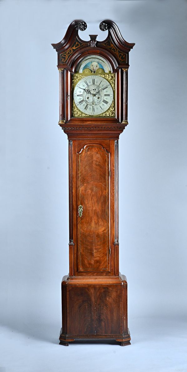 A George III mahogany and brass line-inlaid Longcase clockBy Joshua Harrocks, Lancaster The case with swan-neck pediment above fluted uprights, above