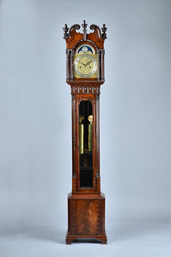 A late Edwardian mahogany Longcase clock of small sizeIn the George III style, with a swan-neck pediment above twin-fluted columns and glazed dial doo