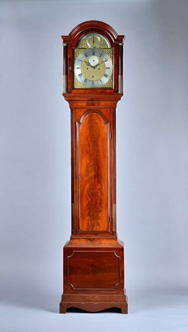 A George III mahogany Longcase clockThe movement by Robert Allam, LondonThe case with an arched pediment, above glazed door and fluted column, the tru
