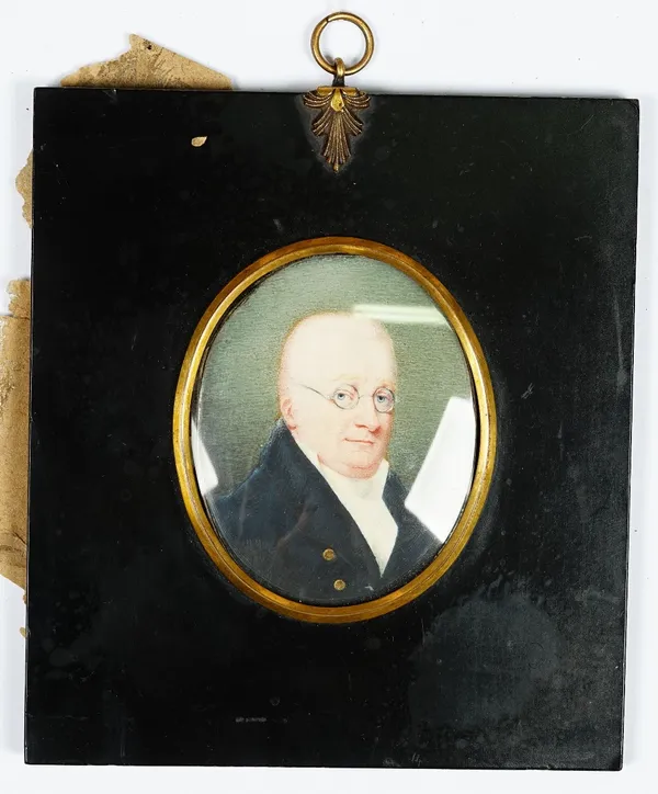 English School, early 19th Century, A portrait miniature of a gentleman wearing glasses, watercolour, 7.5 x 6cm.