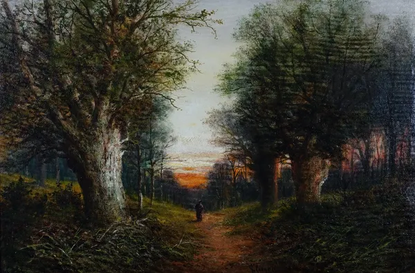 G Linnell (British, late 19th/early 20th Century), A figure on a woodland path, signed 'G Linnell' (lower centre), oil on canvas, 50 x 75cm.