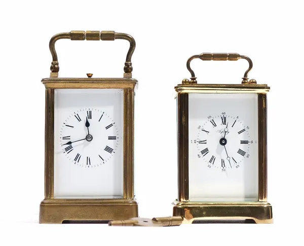 A French brass carriage clock, late 19th century, with visible platform lever escapement, twin train movment and hour repeat striking on a gong, 15cm