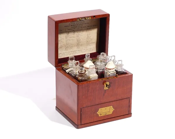 A mahogany campaign apothecary chest, mid 19th century, stamped E.Bentley, London, fitted with bottles above a pull out drawer, 18cm wide x 20cm high.