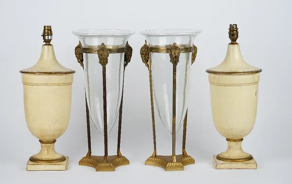 A pair of modern cream painted and gilt banded pottery table lamps, each of urn form, 39cm high, and a pair of gilt metal Empire style table vases wit