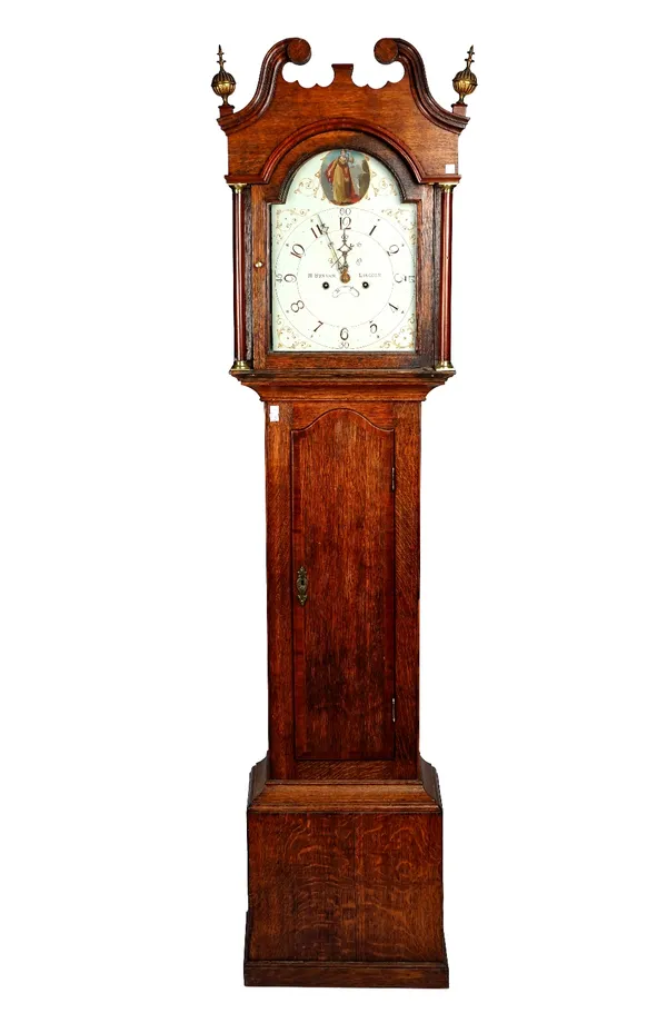 A George III oak longcase clock, the white painted arched dial with a roundel portrait of Lady Justice, signed H. BUNYAN LINCOLN, with key and pendulu