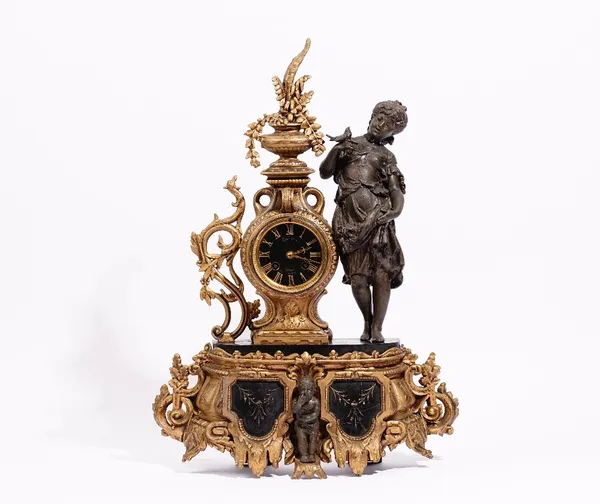 A French gilt spelter and black slate mantel clock, decorated with a bronzed spelter figure of a lady holding a bird, the dial detailed 'CREHANCE, PAR