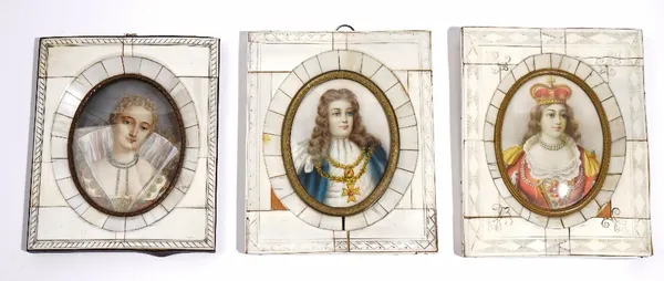 A group of three half-length oval portrait miniatures, early 20th century, glazed within ivory veneer frames, the largest 14cm long x 11cm wide.