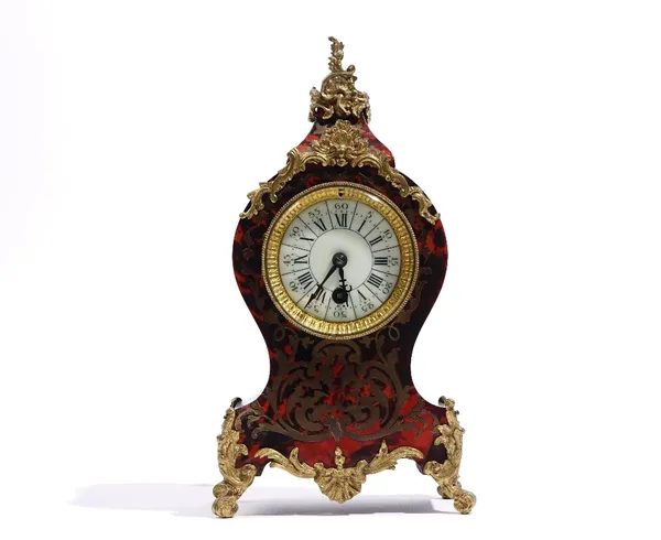 A French gilt-metal mounted, Boulle work mantel timepiece, circa 1890, with one key and pendulum, 30cm high.