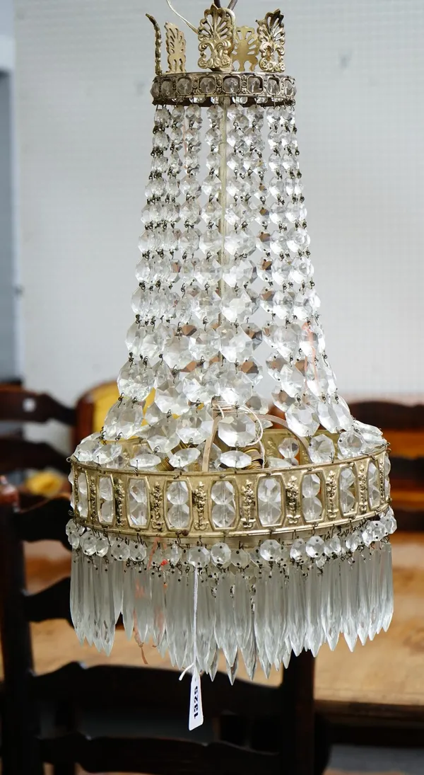 A Regency style glass pendant light fitting, 20th century, with cascades of faceted drops with circlets of spike shaped drops below.