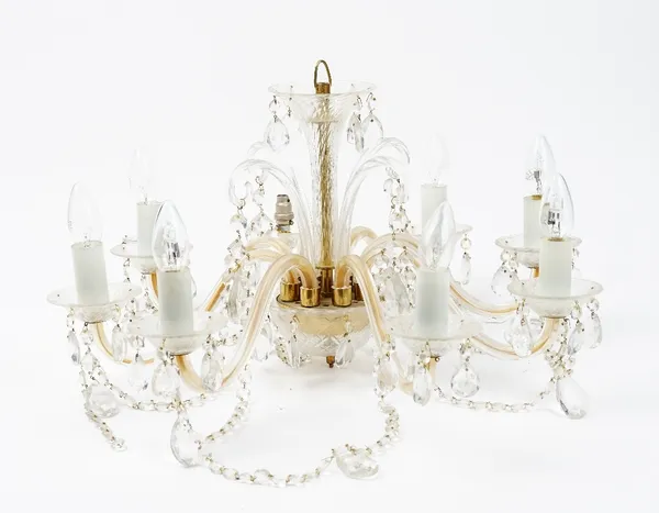 A Modern Italian eight light chandelier, with scrolled branches, hung with pear shape and swag drops.