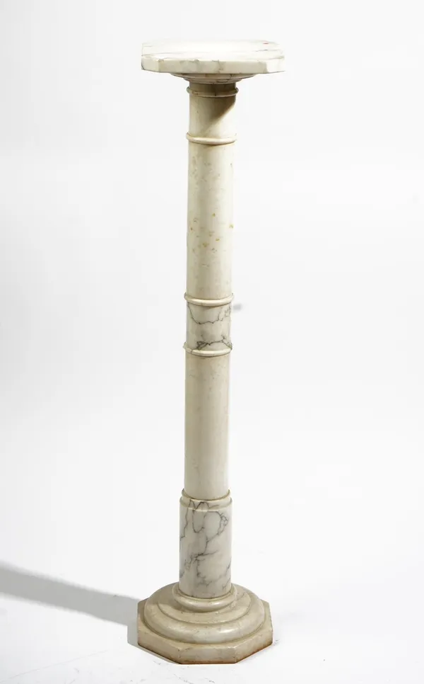 A white and grey onyx pedestal, 20th century, 21cm wide x 96cm high.