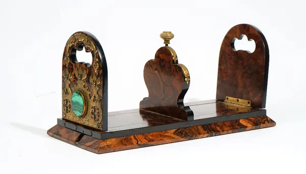 A Victorian coromandel wood, gilt metal mounted adjustable book rack, the hinged arched folding ends with cut-out handles and malachite roundels, 40.5