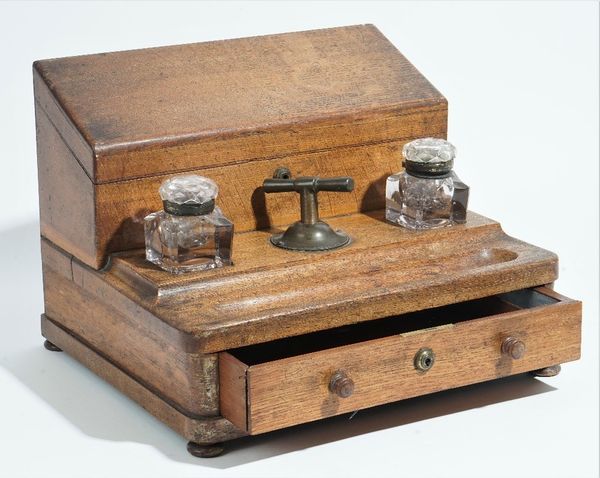 S. MORDAN & Co'S;  a late 19th century oak copying press with twin lidded inkwells, 38cm wide x 29cm high.