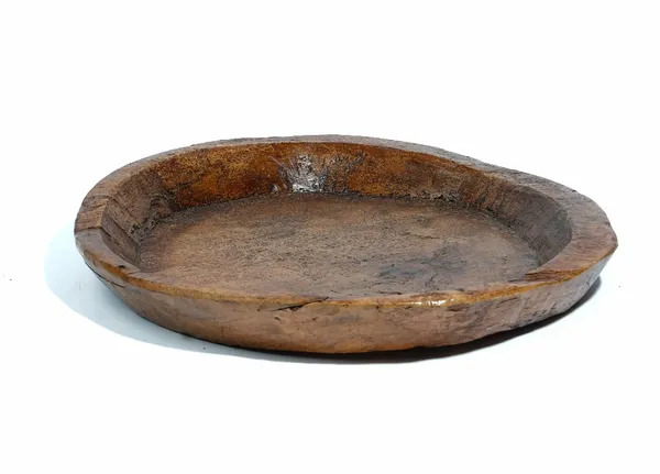 A large dugout hardwood circular shallow bowl, 54cm diameter x 9cm high.