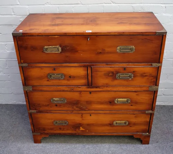 A campaign style brass bound yew secretaire chest, the fitted drawer over two short and two long drawers on bracket feet, 91cm wide x 94cm high.