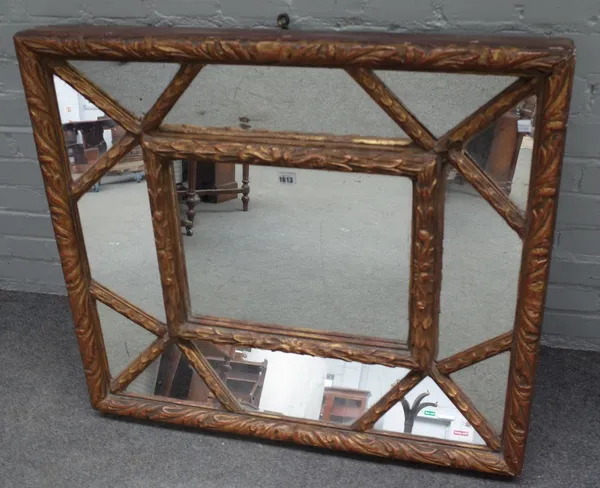 A 20th century gilt cushion framed marginal wall mirror with acanthus moulded frame, 86cm wide x 77cm high.