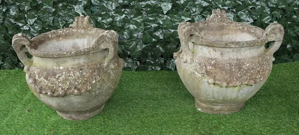 A pair of reconstituted stone tyg style jardinieres with three loop handles and floral moulded body, 39cm diameter x 40cm high.