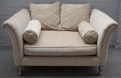 House of Fraser 'New Vintages', a modern two seat sofa with outswept arms and spiral fluted silvered supports, 150cm wide x 84cm high.