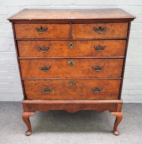 A George III pollard oak chest on stand with two short and three long graduated drawers, the later stand with pad feet, 90cm wide x 110cm high.