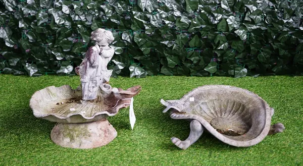 A 19th century lead shell shaped bird bath with cherub and bird mount, 40cm wide x 16cm high (excluding cherub a.f) together with another similar (2)