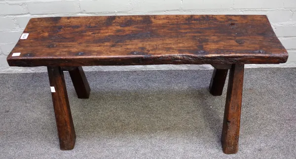 A rustic oak pig bench, 18th/19th century, the rectangular top on splayed spreading legs, 91.5cm wide x 39cm deep x 44cm high.