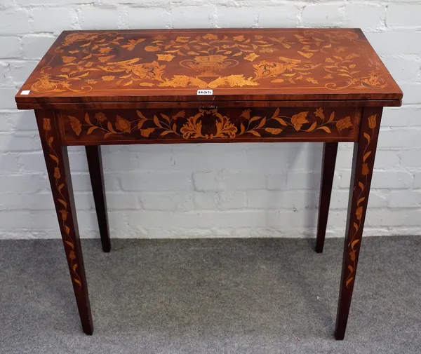 A 19th century Dutch floral marquetry inlaid rectangular card table on tapering square supports, 80cm wide x 76cm high.