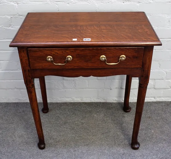 A mid-18th century oak single drawer lowboy, on club supports, 68cm wide x 72cm high.