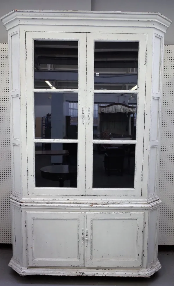 A large Dutch 18th century style white painted display cabinet cupboard, the glazed upper with swept sides over cupboard base, 163cm wide x 256cm high