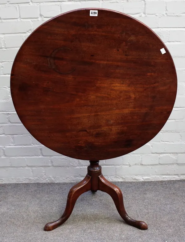 A George III and later mahogany tea table, the circular top on a vase turned pillar and tripod base, 76cm diameter x 70cm high.