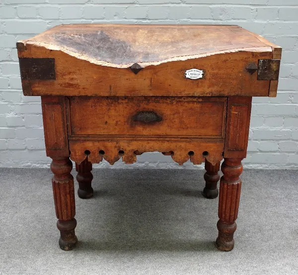 J Montgolfier 18 Ripe d'A Isace Beziers; an early 20th century butcher's block with knife slot back, the stained beech base with single drawer and sha