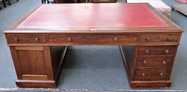 'Davis & Co. Tottenham Court Road; an early 19th century mahogany pedestal partners desk with nine drawers about the knee and opposing cupboards, 183c