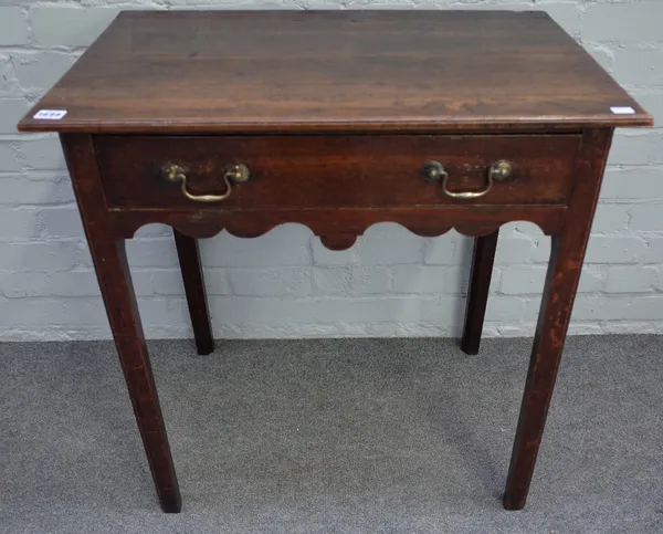 A George III oak side table, with frieze drawer and wavy apron, on moulded square legs, 71cm wide x 46cm deep x 73cm high.