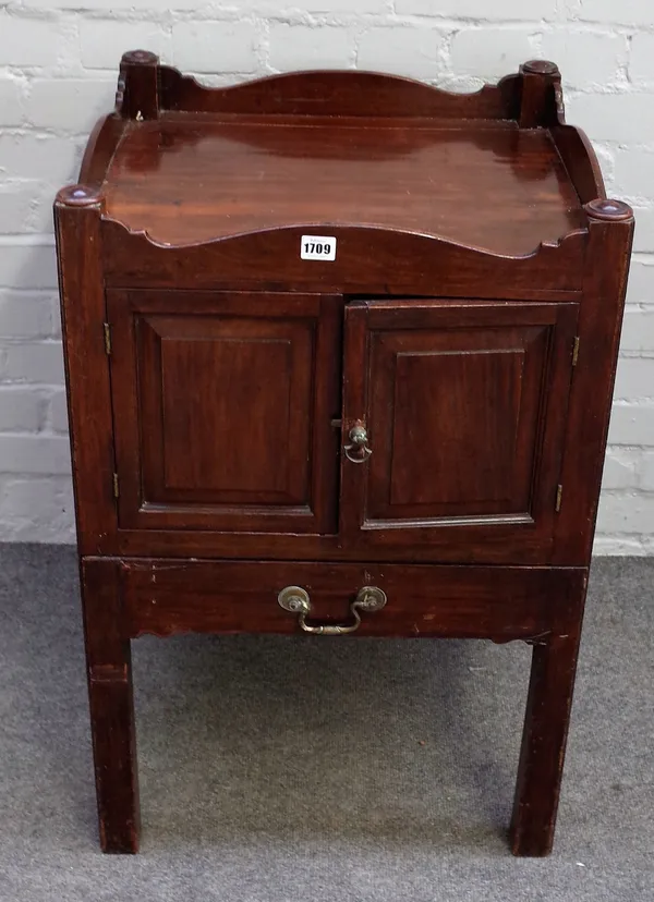 A George III mahogany tray top night commode, enclosed by a pair of raised and fielded panel doors with an altered pull-out slide below, 53cm square x