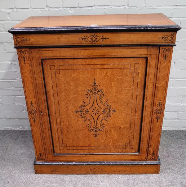 A 19th century inlaid oak single door pier cabinet, on plinth base, 93cm wide x 102cm high.