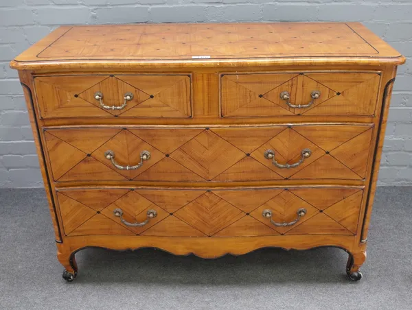 An 18th century style scumble painted serpentine chest with two short and two long graduated drawers on scroll feet, 118cm wide x 87cm high.