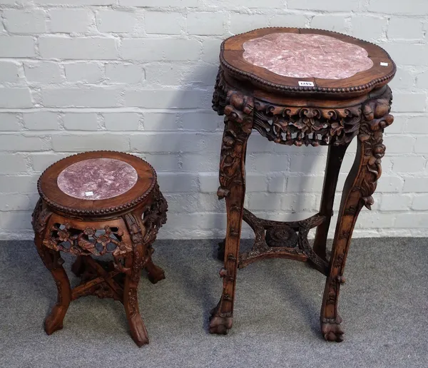 An early 20th century Chinese jardineire stand the marble inset top over carved frieze on four paw feet, 53cm diameter x 80cm high, together with a si