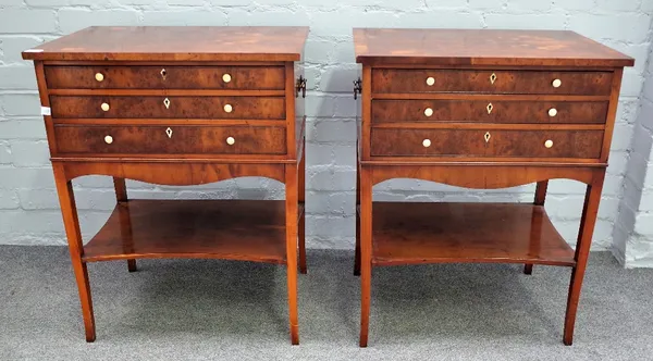 A pair of George III style figured yew three drawer side cabinets on splayed square supports united by a concave platform undertier, 56cm wide x 71cm