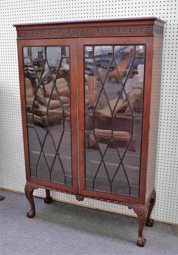 A pair of George III and later mahogany astragal glazed two door display cabinets, on claw and ball feet, 106cm wide x 162cm high, (2).