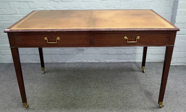 A reproduction George III style mahogany writing table, with inset top above two frieze drawers, on square tapered legs, 129cm wide x 72cm deep x 76cm